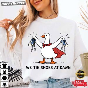 We Tie Shoes At Dawn First Grade Teacher Elementary School T Shirt (1)